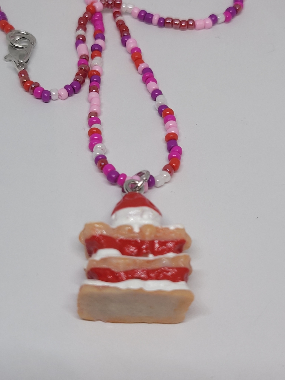 Beaded Necklace with Red & Pink Cake Pendant -